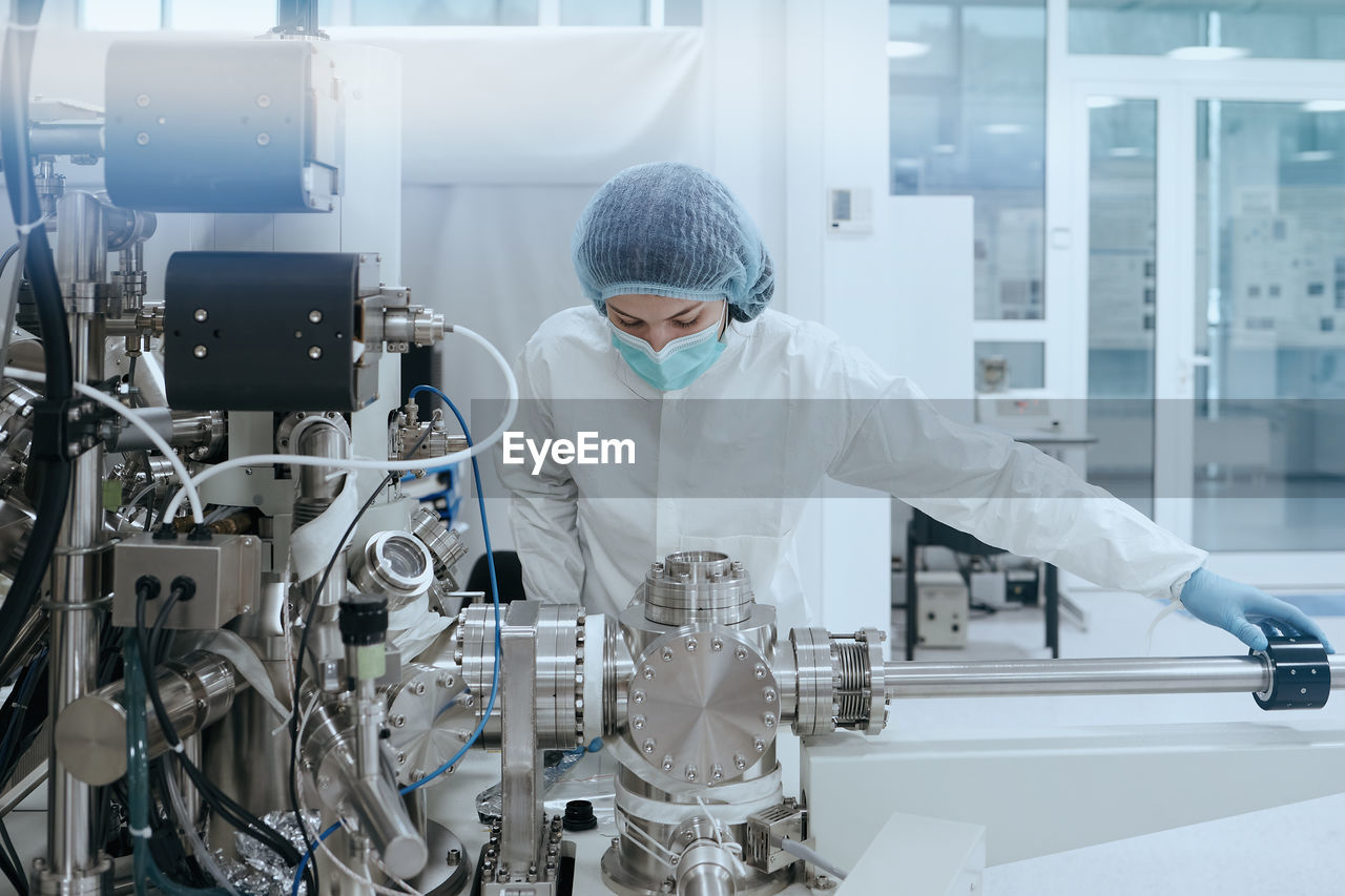 side view of scientist working in laboratory