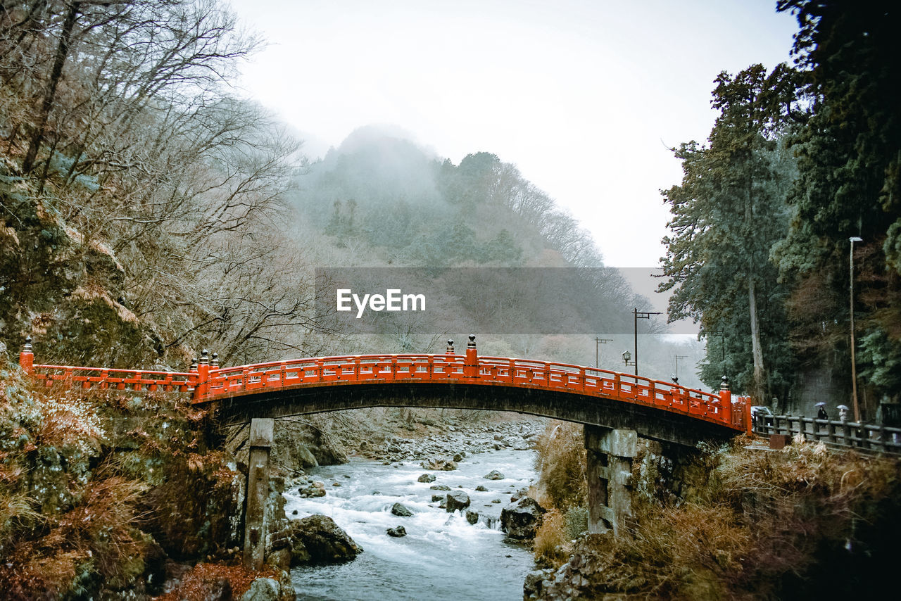 Nikko bridge over river against sky