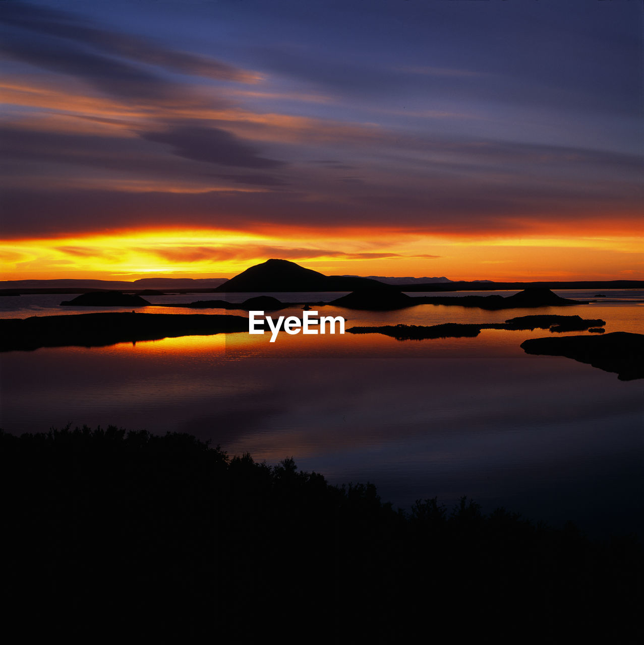 Lake myvatn in north iceland at a calm sunset