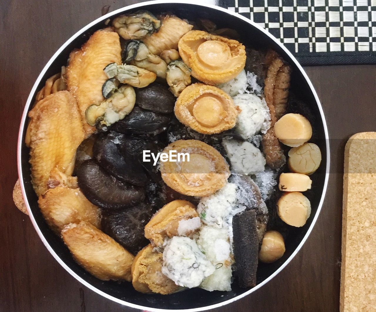 Directly above shot of desserts in bowl served on table