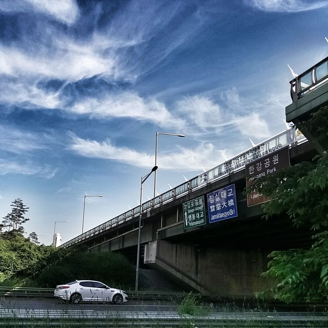 SUSPENSION BRIDGE AGAINST SKY