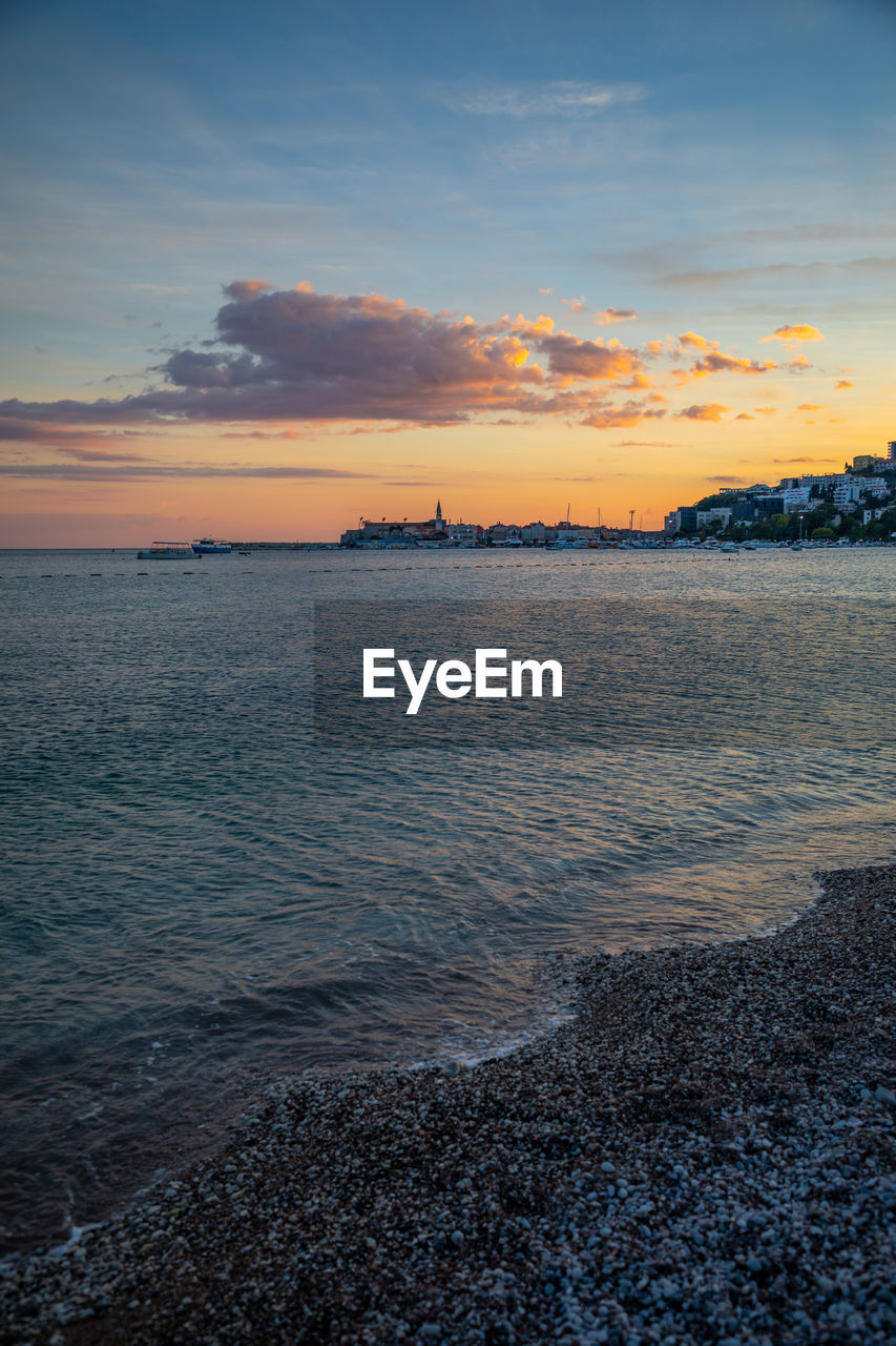 SCENIC VIEW OF SEA DURING SUNSET