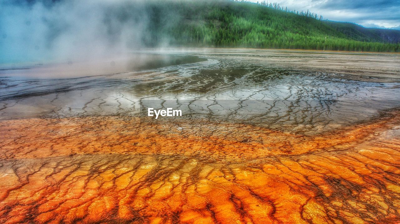 High angle view of steam emitting from geyser