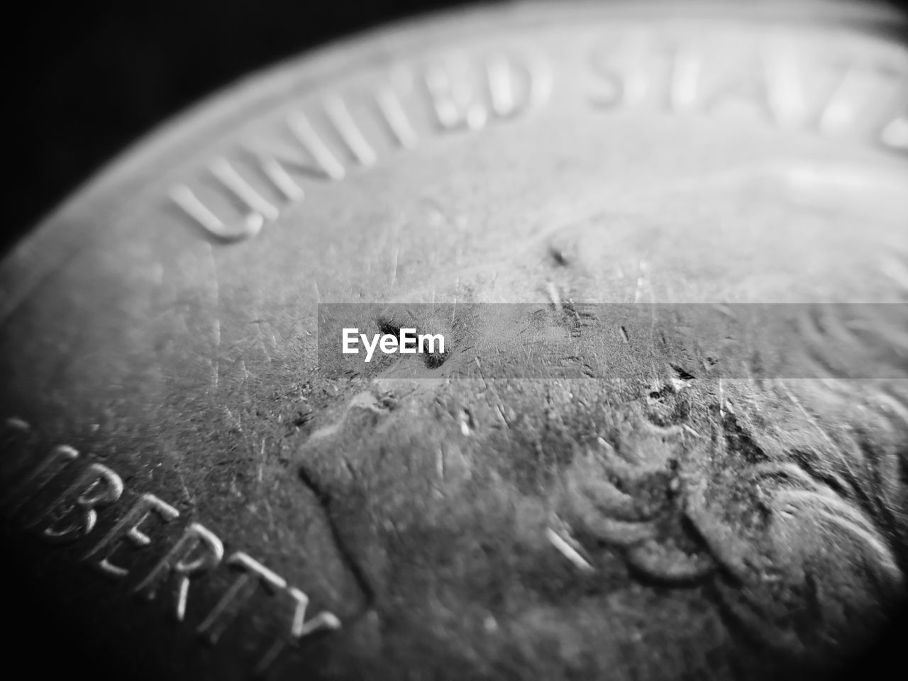 HIGH ANGLE VIEW OF TEXT ON METAL SHEET