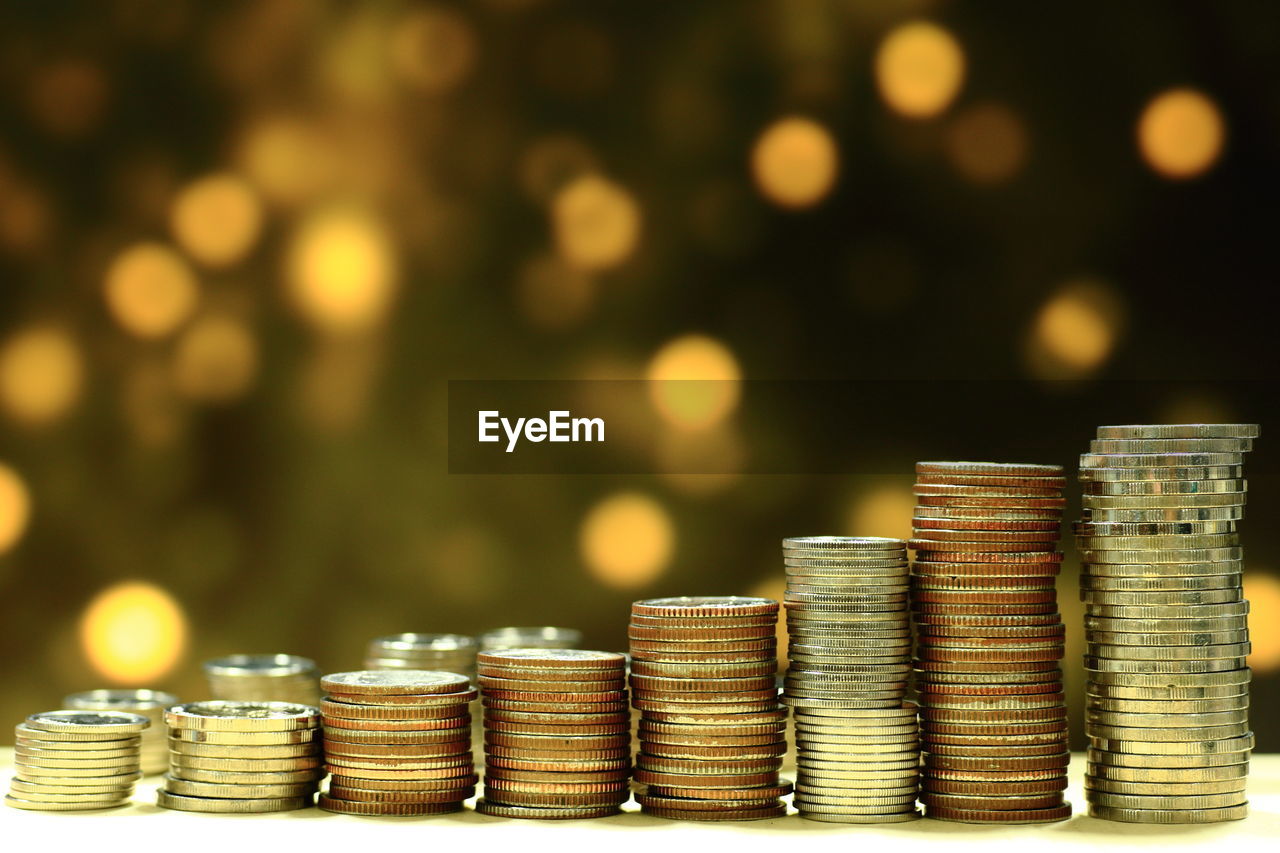 Close-up of coins on table