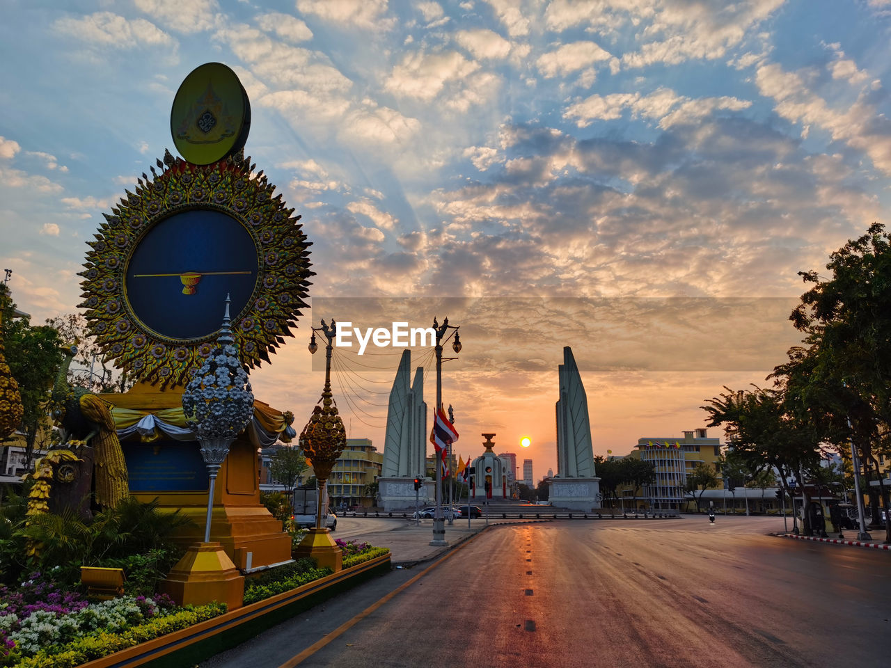 Cityscape, sunrise on the democracy monument in bangkok.