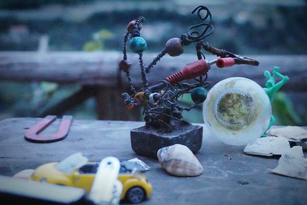 Close-up of group of objects on table