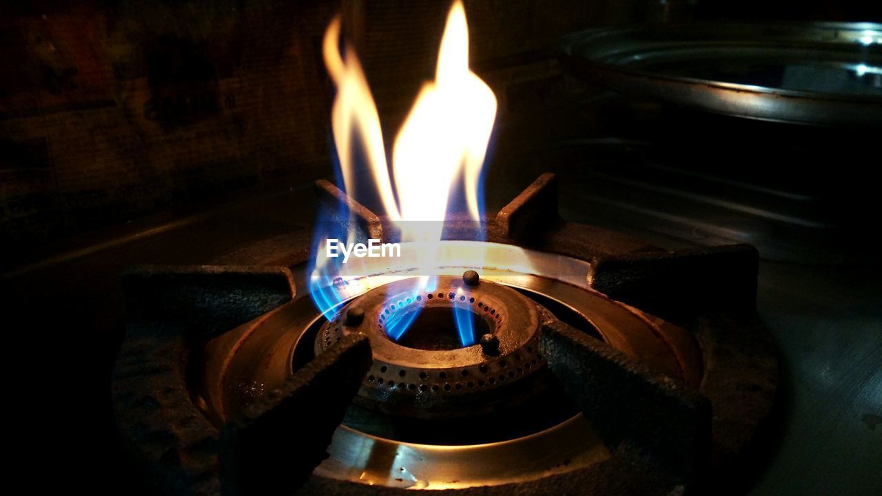 High angle view of gas stove burner in kitchen