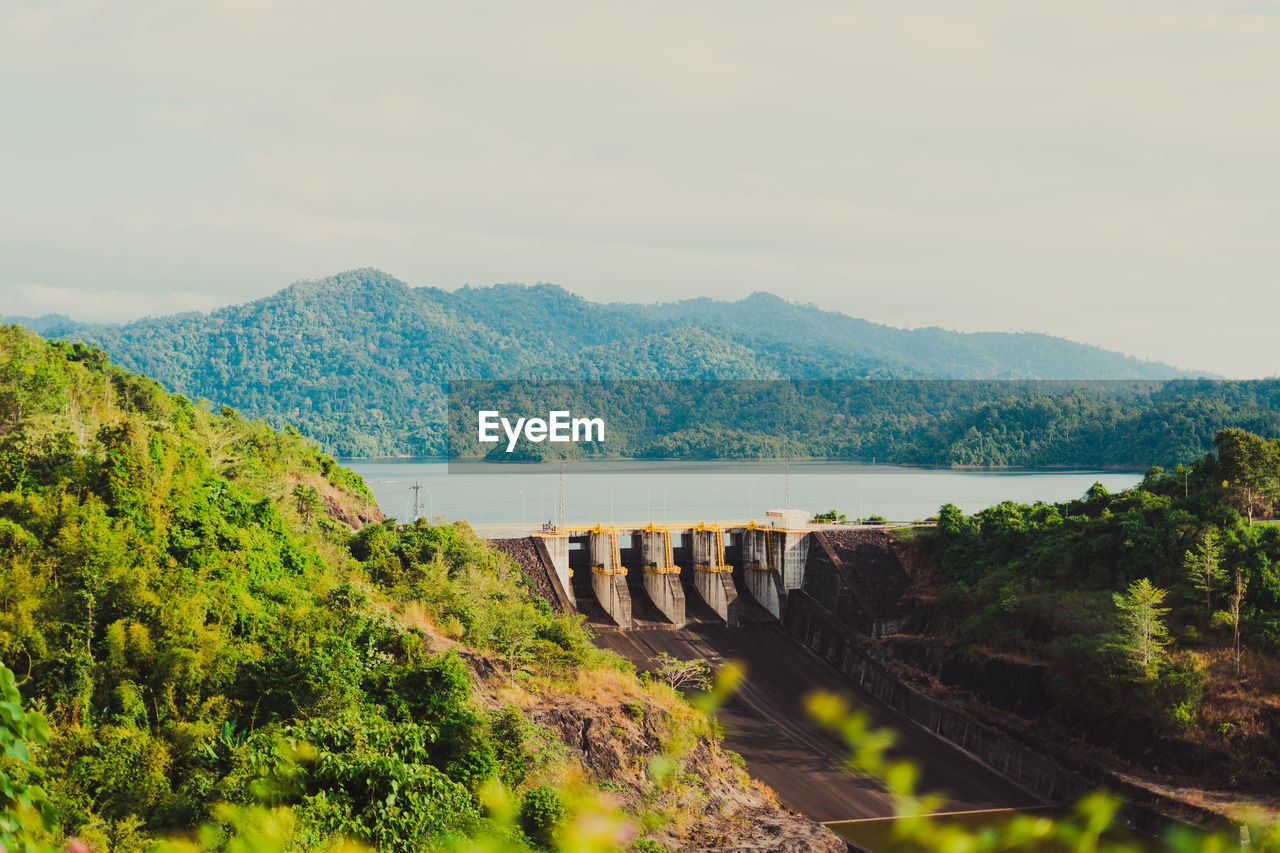 SCENIC VIEW OF DAM AND TREES AGAINST SKY