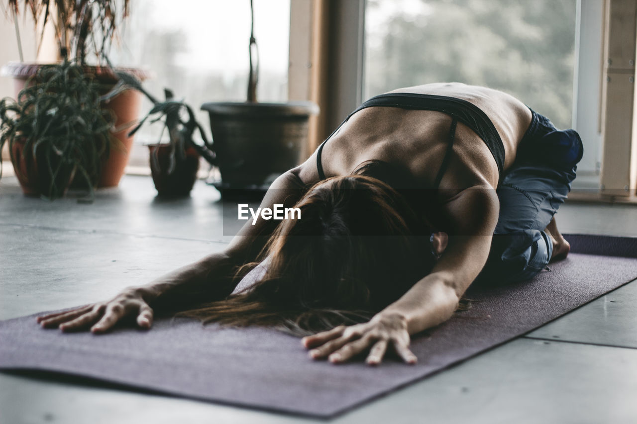 Woman exercising at home