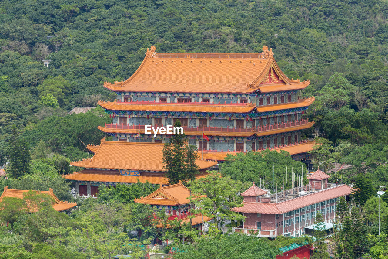 TEMPLE BUILDING WITH TREES IN BACKGROUND
