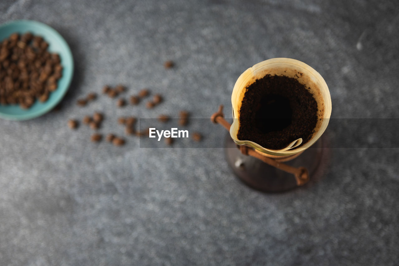 high angle view of coffee on wooden table