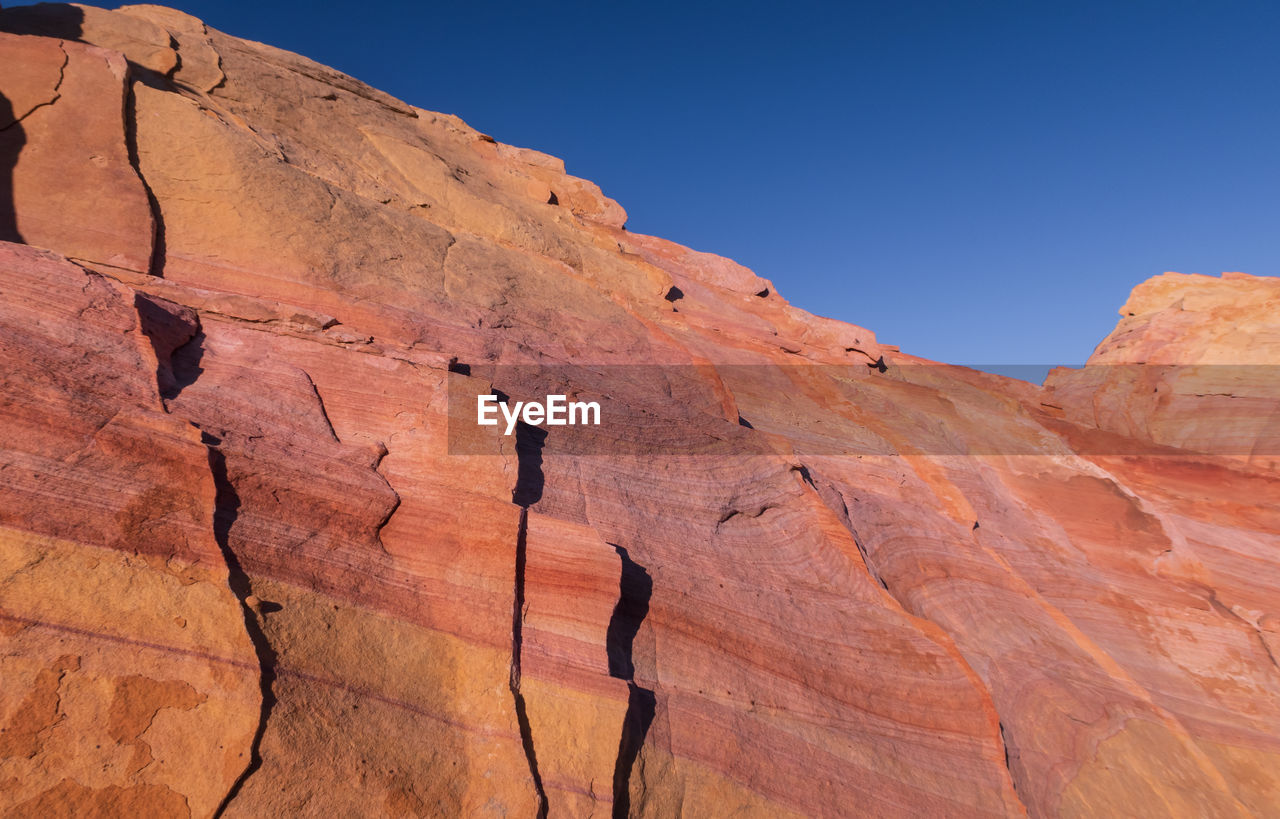 Landscape of large pink and orange rock formation at valley of fire state park in nevada