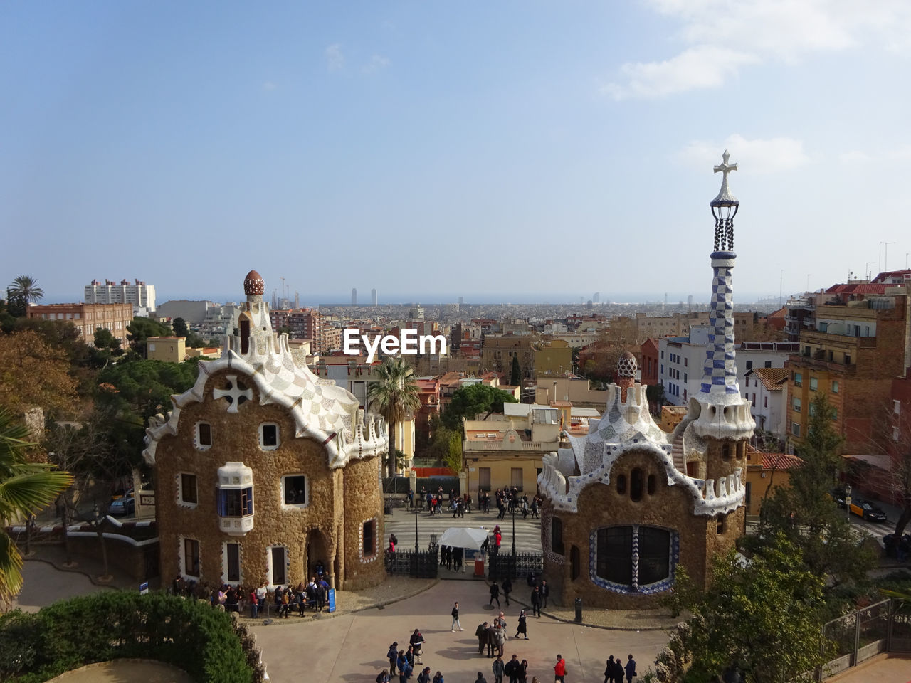 High angle view of buildings in town against sky