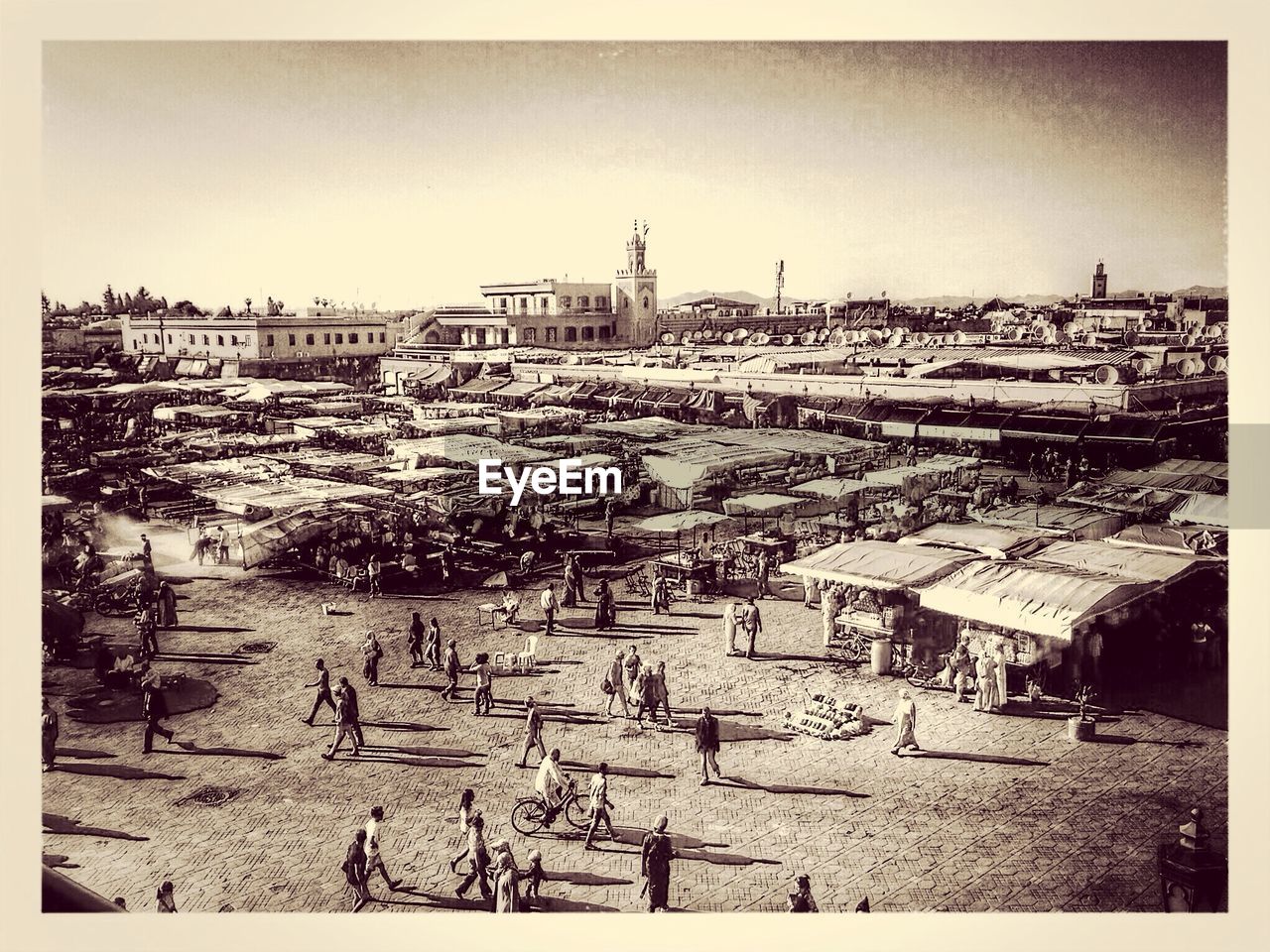 High angle view of people at market against sky