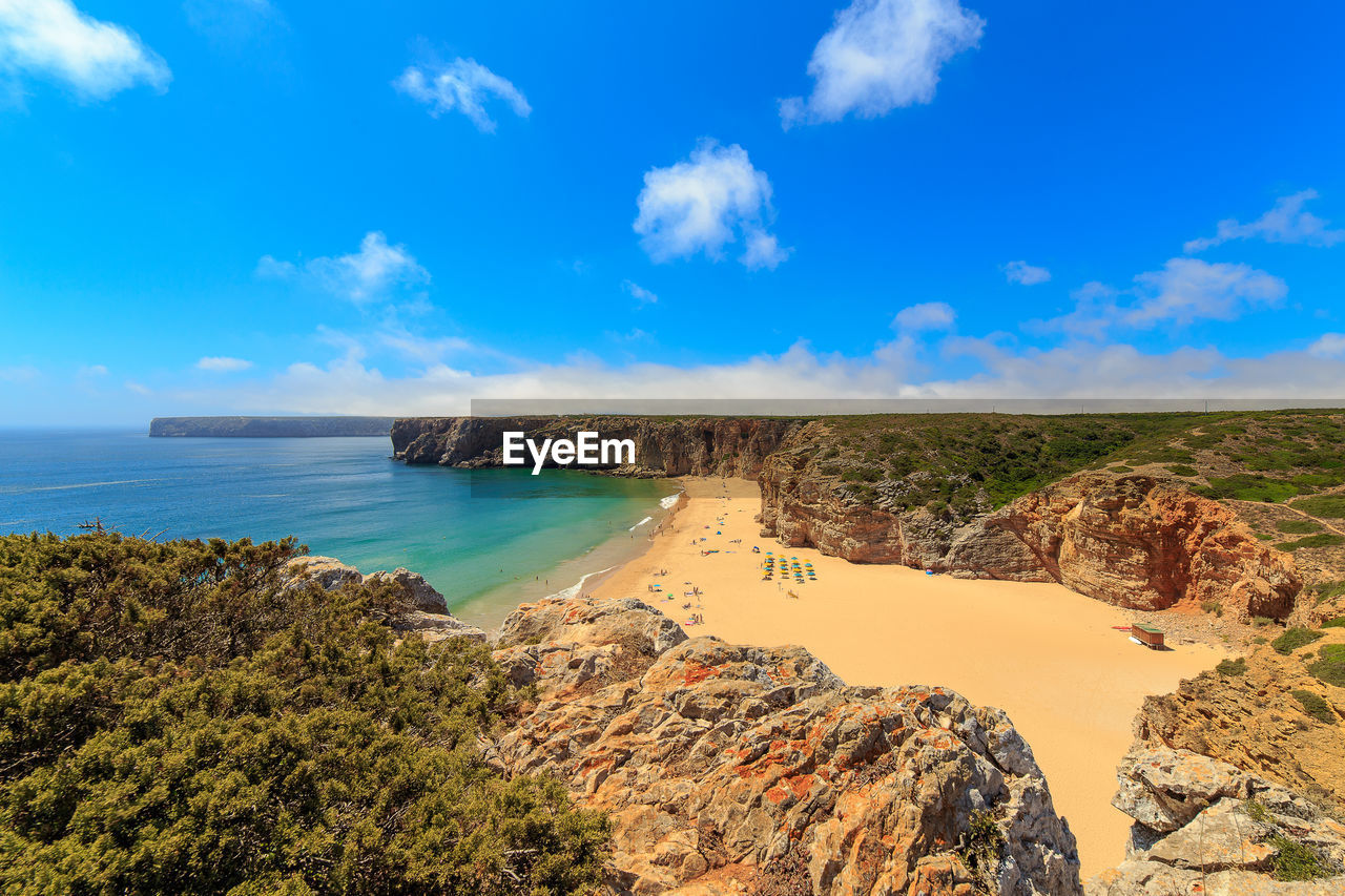 Scenic view of sea against cloudy sky