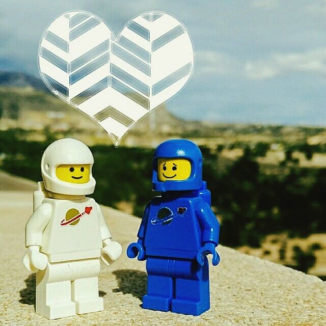childhood, toy, human representation, child, nature, two people, representation, robot, men, blue, cartoon, day, sky, outdoors, fun, astronaut