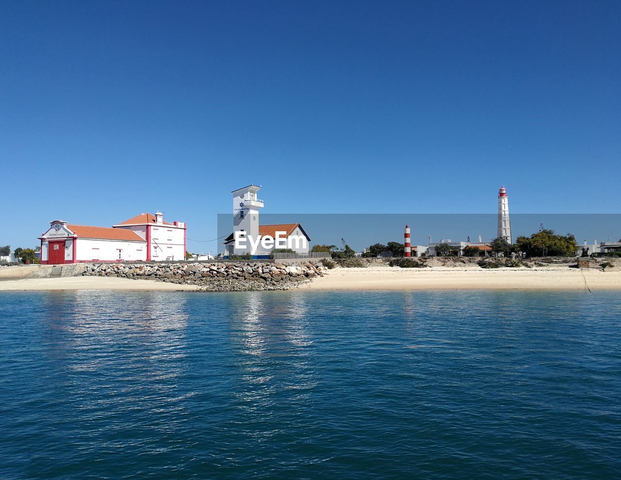 View of buildings on ilha do farol from the sea