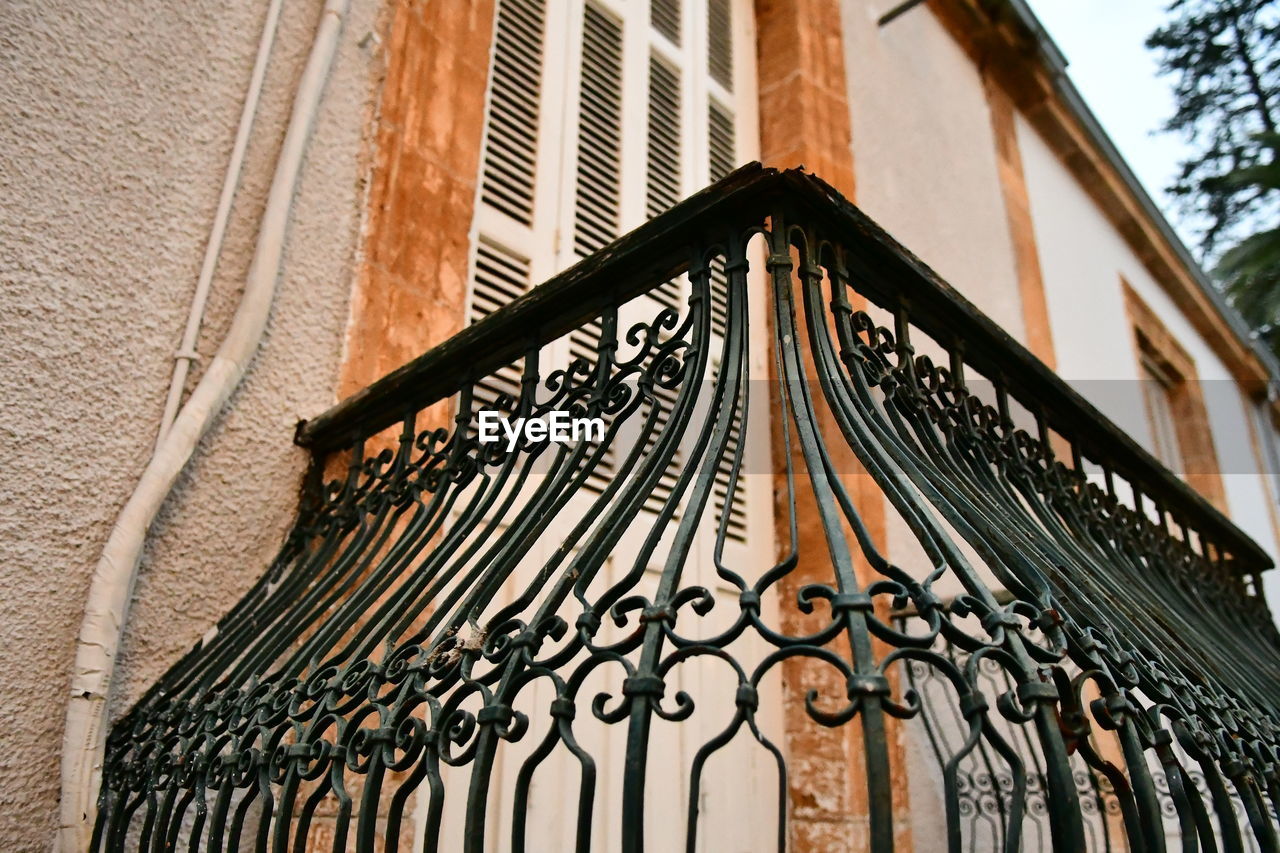 Old rusted balcony railing , traditional architecture element