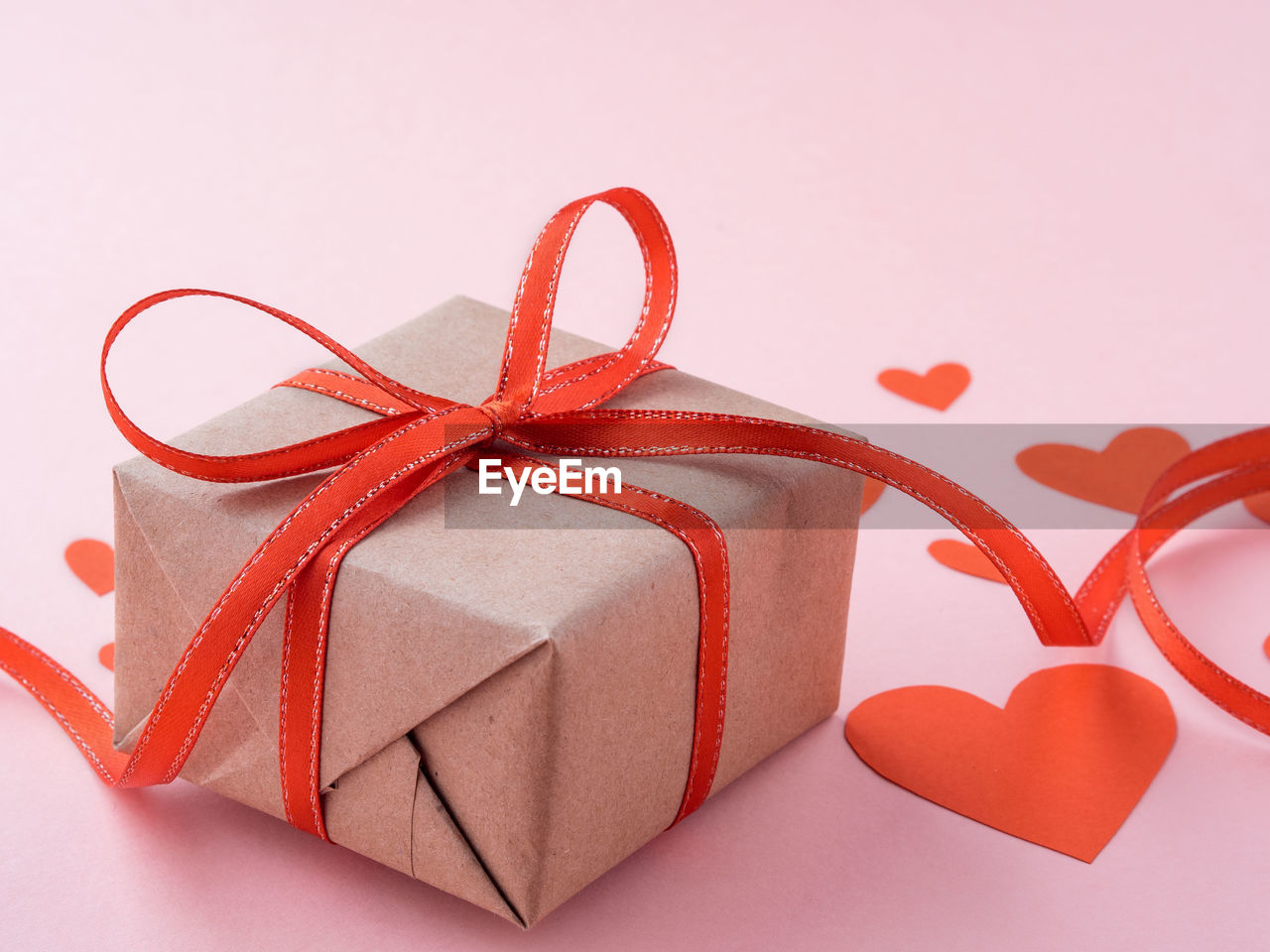 Close-up of gift box on pink background