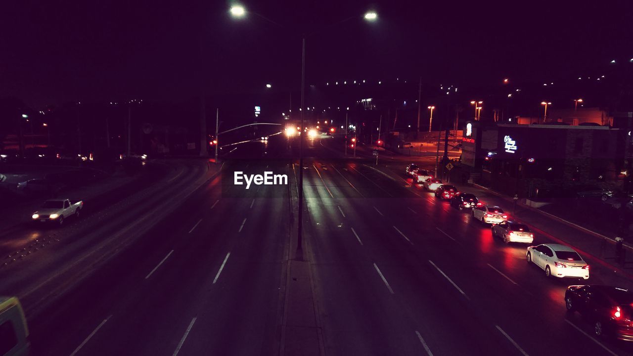 TRAFFIC ON ROAD AT NIGHT