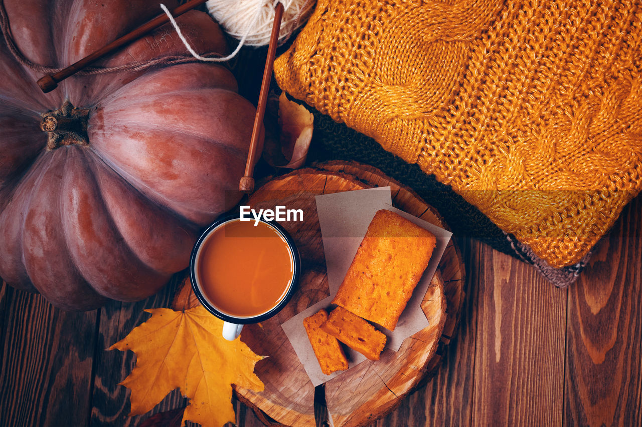 HIGH ANGLE VIEW OF PUMPKIN ON TABLE IN RESTAURANT