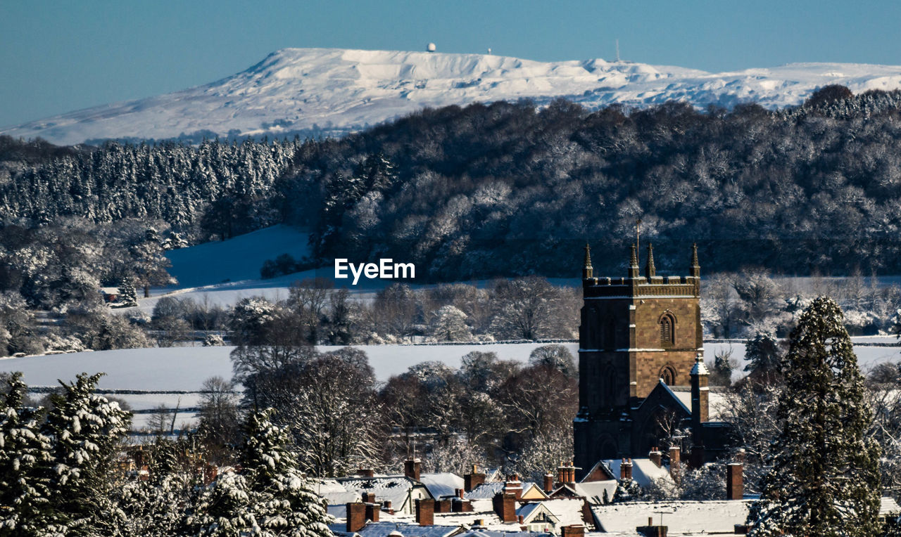 VIEW OF CHURCH IN SNOW