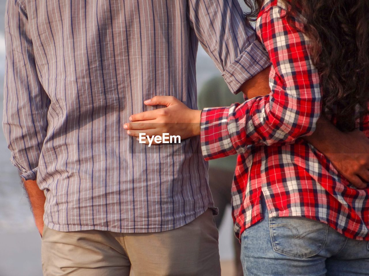 two people, men, adult, togetherness, casual clothing, midsection, love, plaid, emotion, women, shirt, bonding, positive emotion, holding hands, young adult, checked pattern, pattern, standing, hand, clothing, romance, lifestyles, female, tartan, affectionate, day, person, indoors