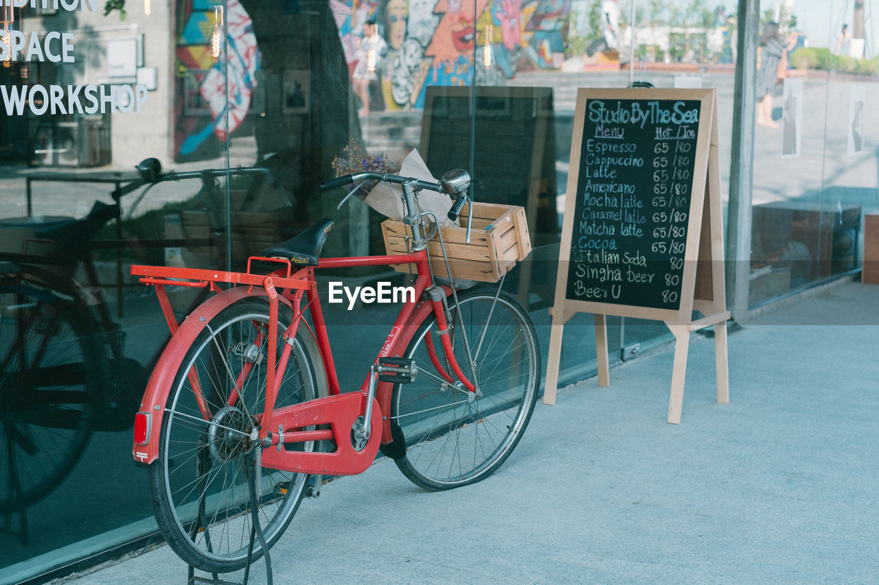 Bicycle parked on street in city