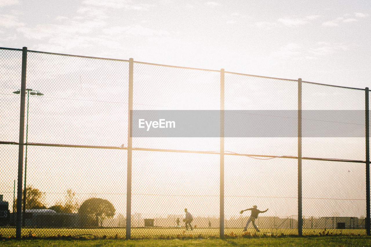 VIEW OF A FENCE ON FIELD