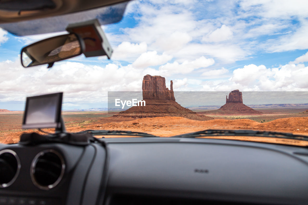 SCENIC VIEW OF SKY SEEN THROUGH CAR