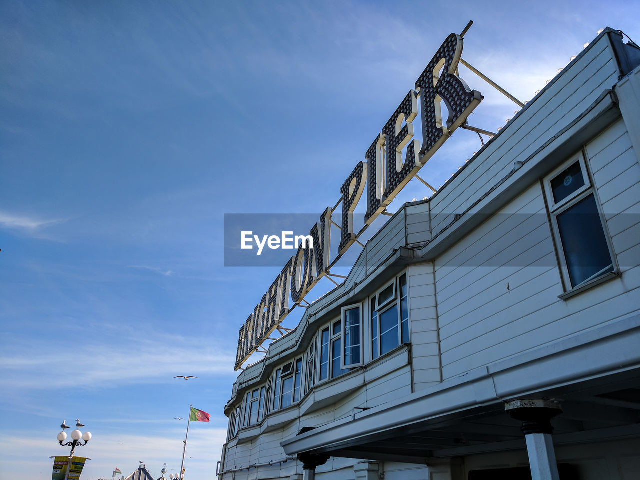 LOW ANGLE VIEW OF BUILDINGS AGAINST SKY