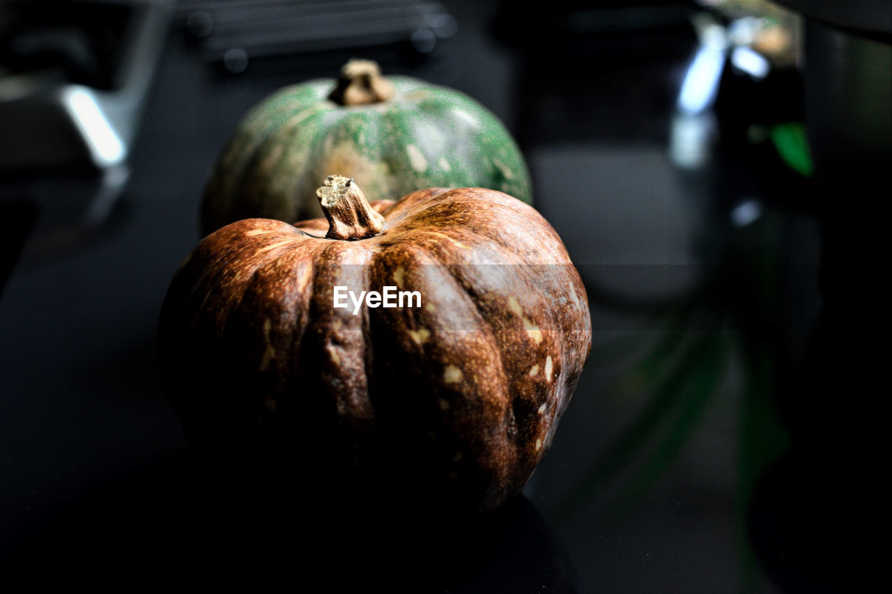 Close-up of pumpkins on table