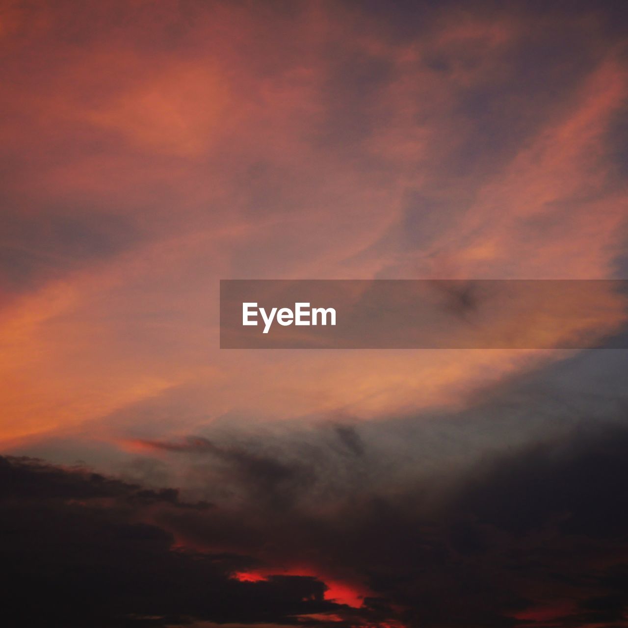 LOW ANGLE VIEW OF ORANGE CLOUDY SKY
