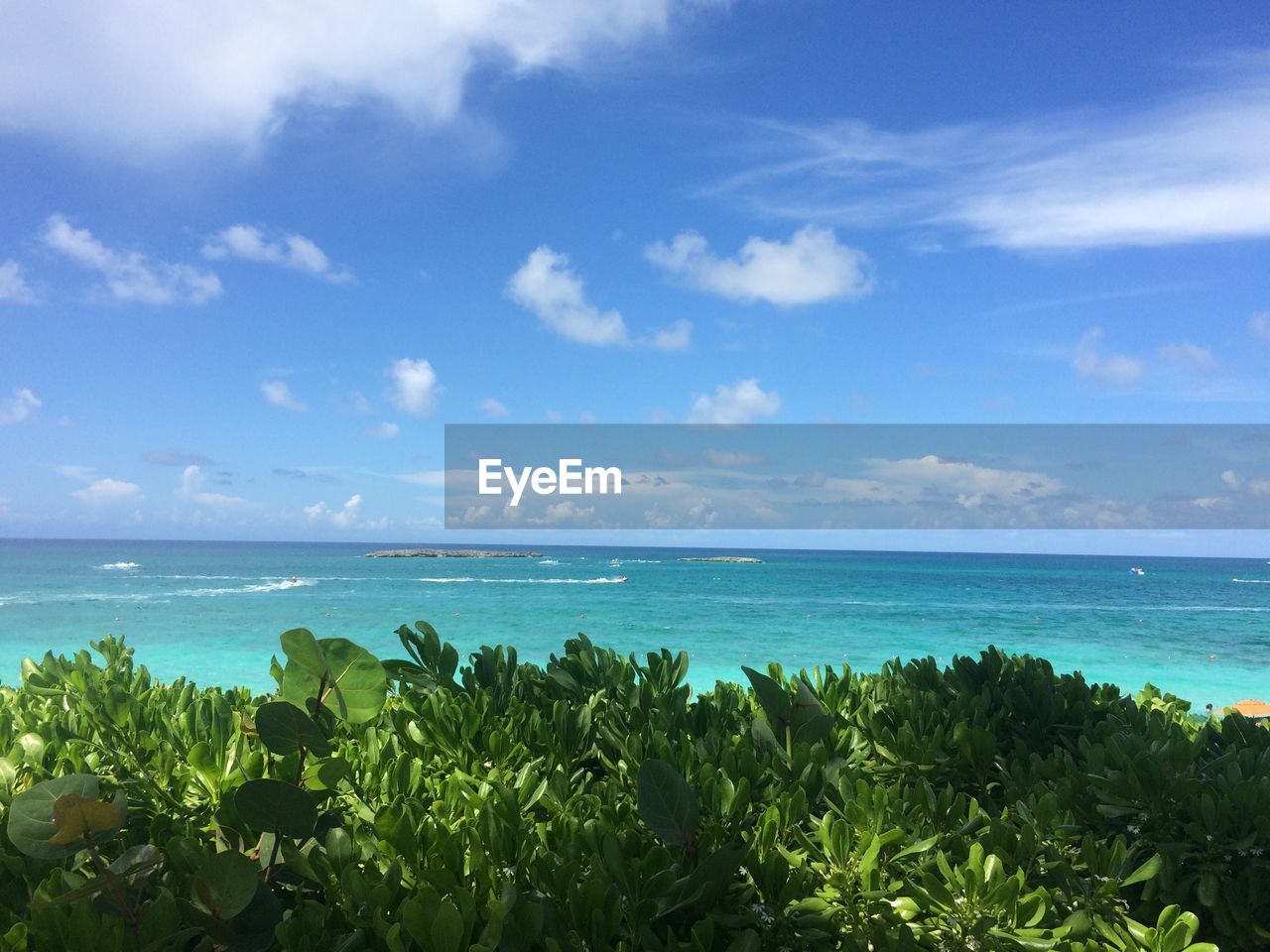 Scenic view of calm sea against clear sky