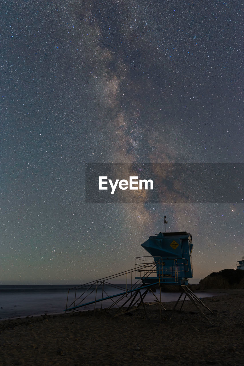 Milky way over a lifeguard tower in malibu california