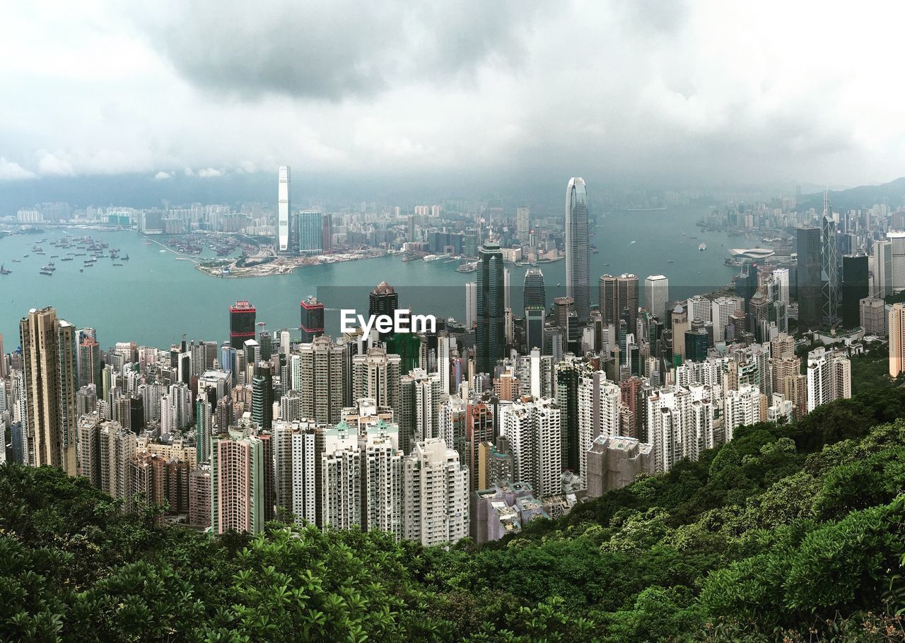 Victoria harbour against cloudy sky