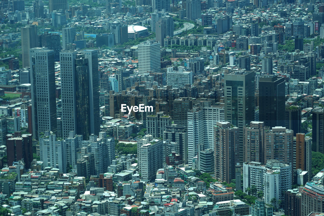 HIGH ANGLE VIEW OF MODERN CITY BUILDINGS