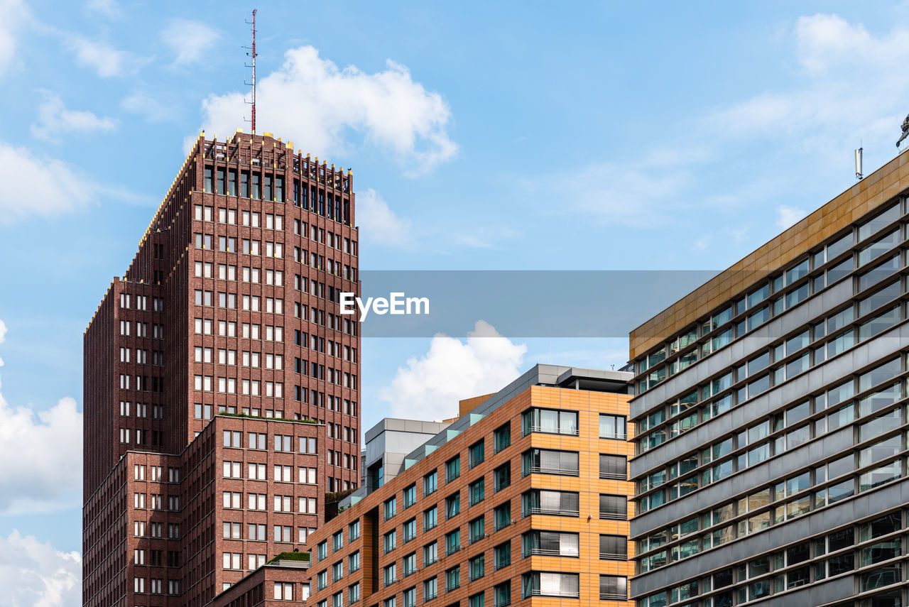 Low angle view of residential and office buildings in berlin mitte, germany.