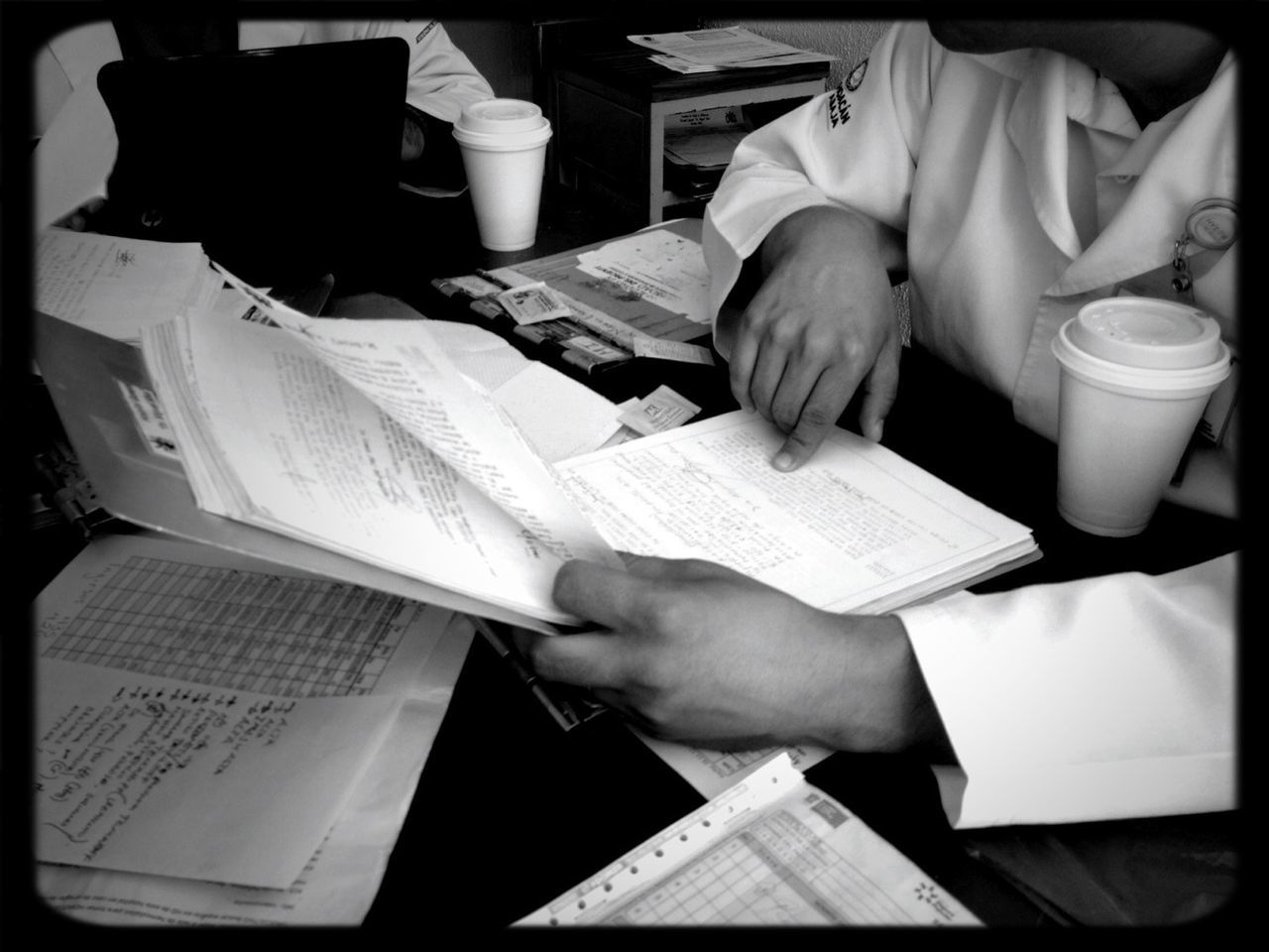 CROPPED IMAGE OF WOMAN HOLDING BOOK