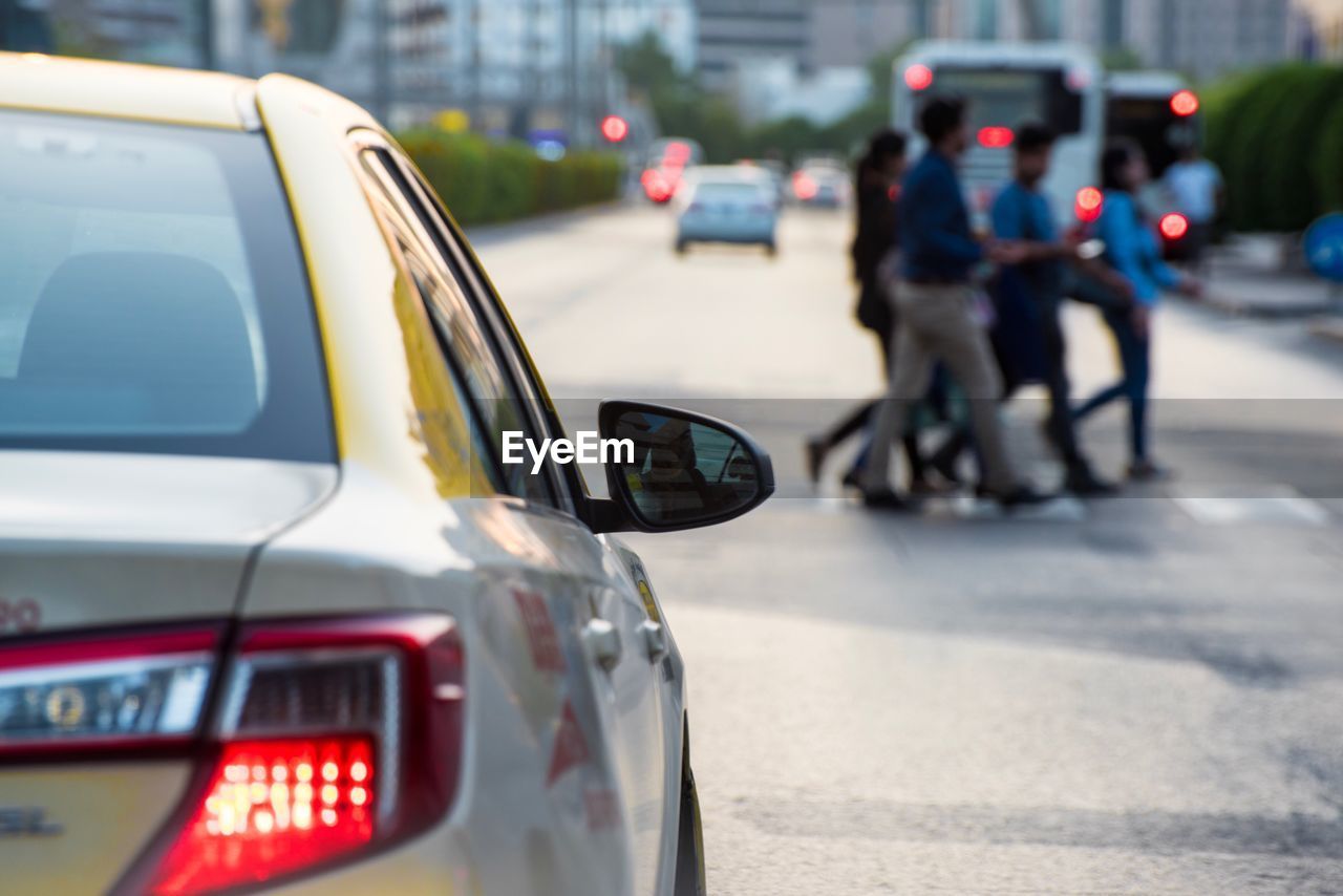 Close-up of car on street