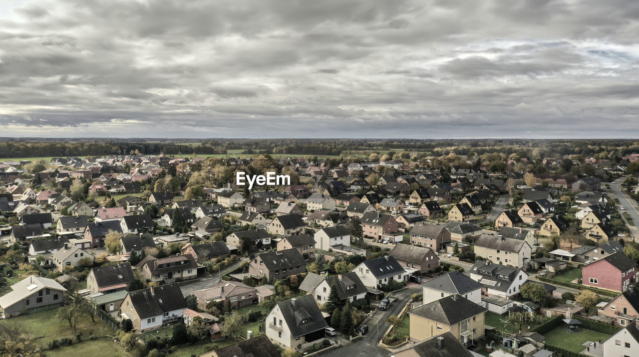 Aerial view of a settlement with houses from the 1950s, desaturated