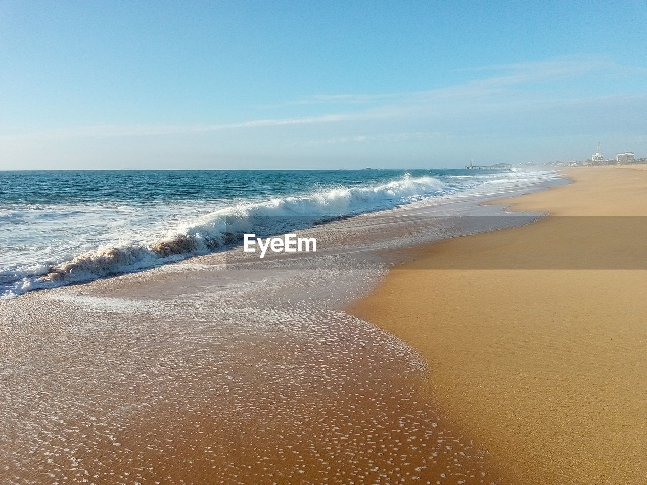 VIEW OF BEACH AGAINST CLEAR SKY