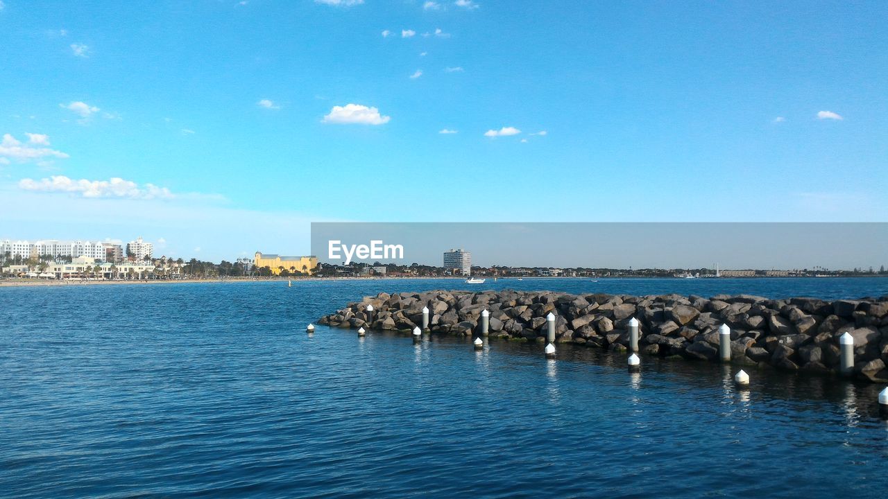 VIEW OF SEA AGAINST BLUE SKY