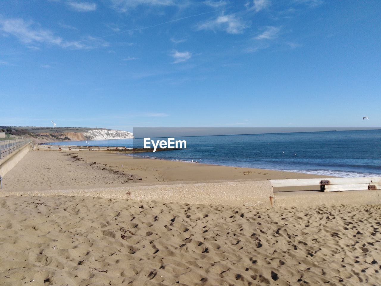 Scenic view of beach against sky