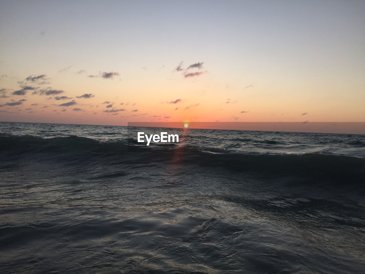 Scenic view of sea during sunset