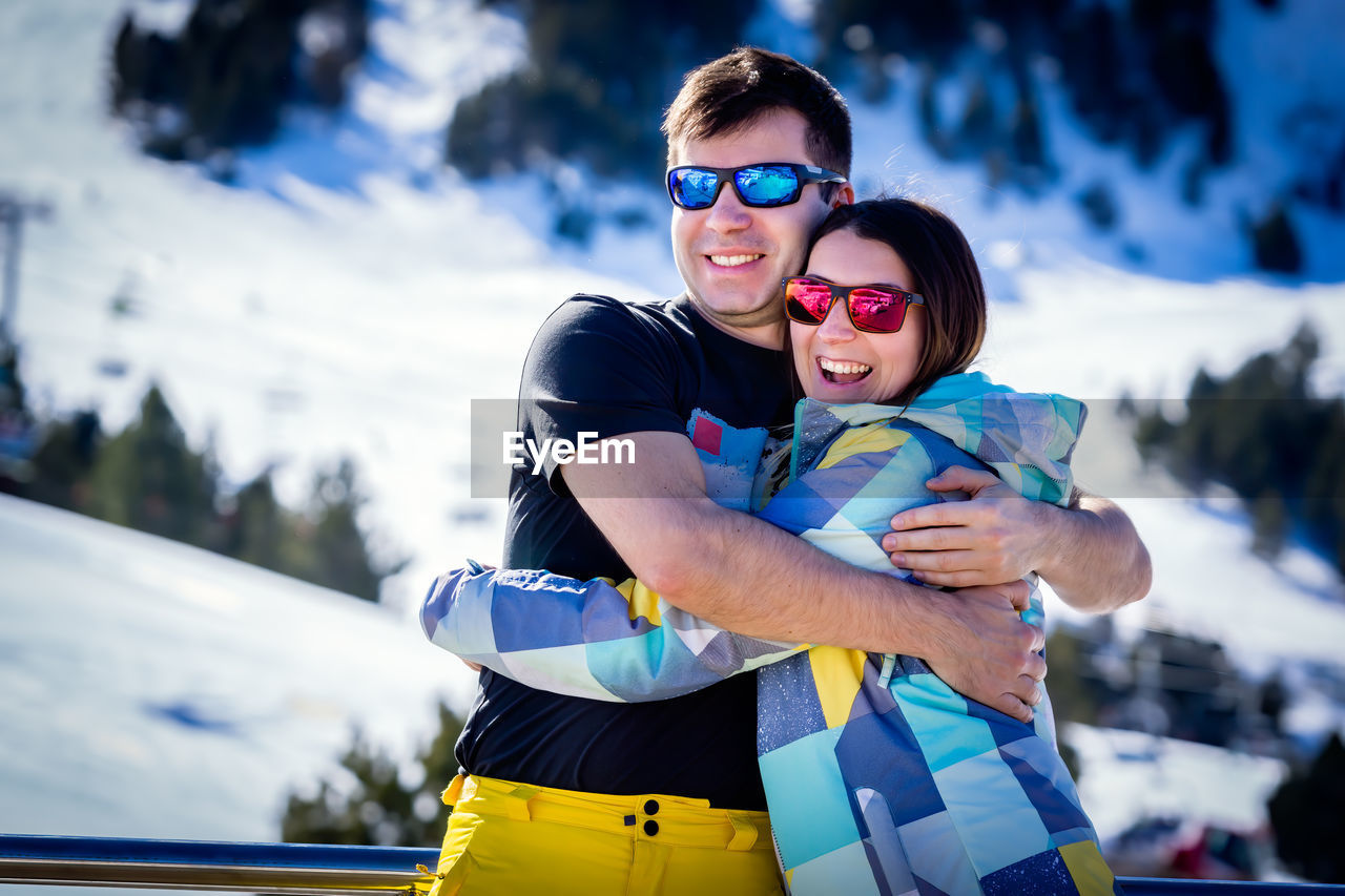 PORTRAIT OF HAPPY MOTHER AND SON