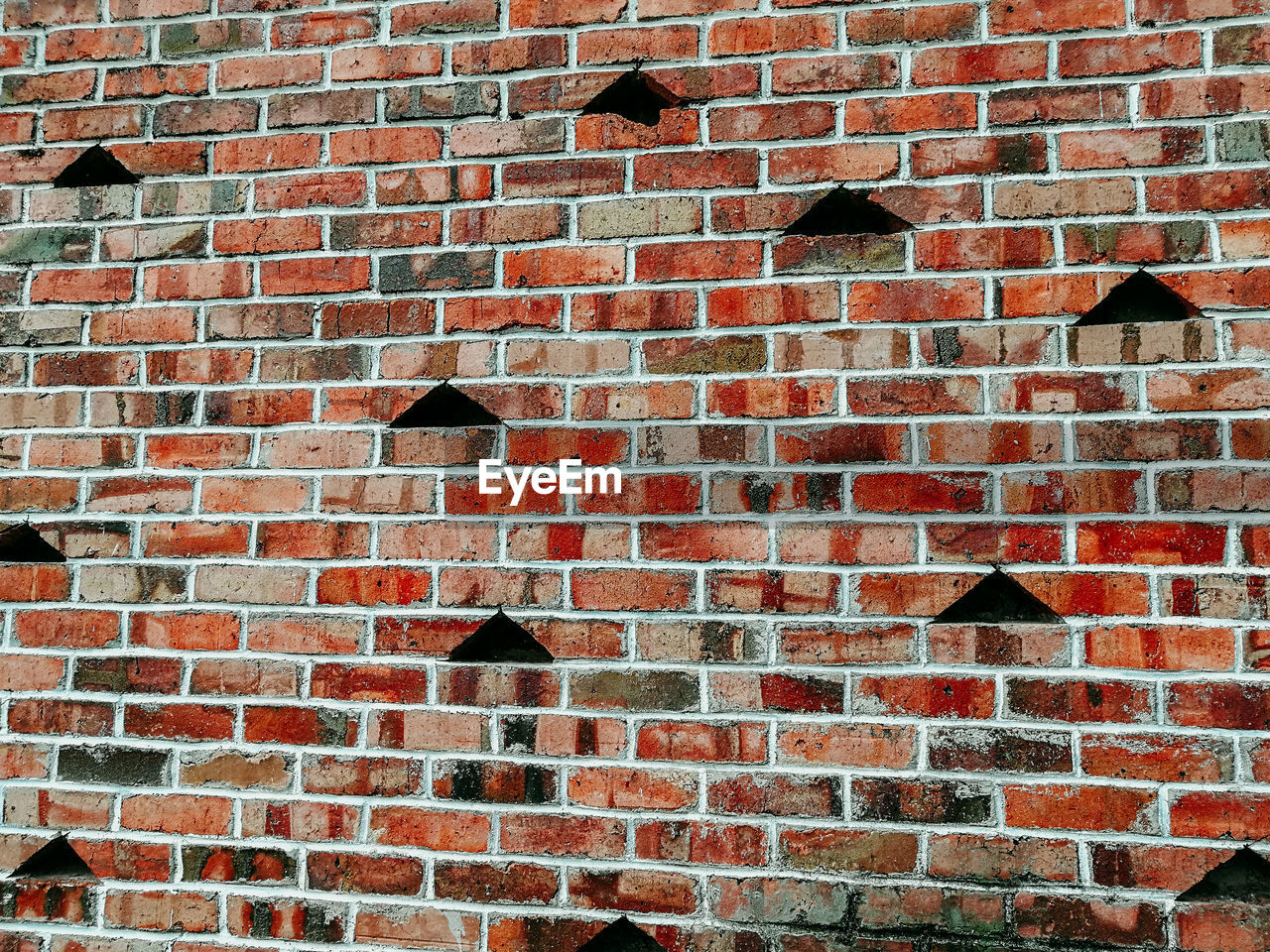 Low angle view of brick wall in outdoor