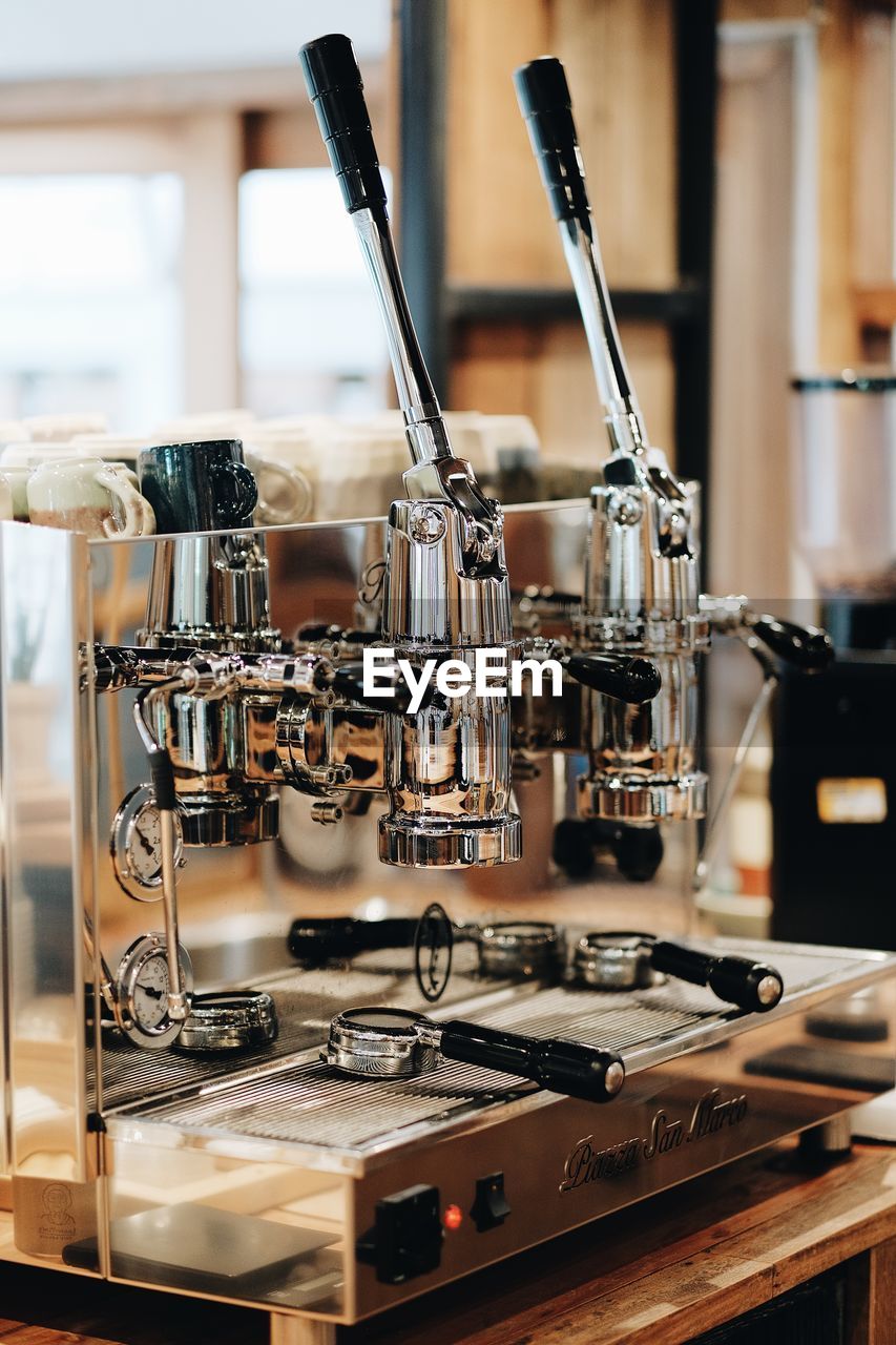 Close-up of espresso maker in cafe