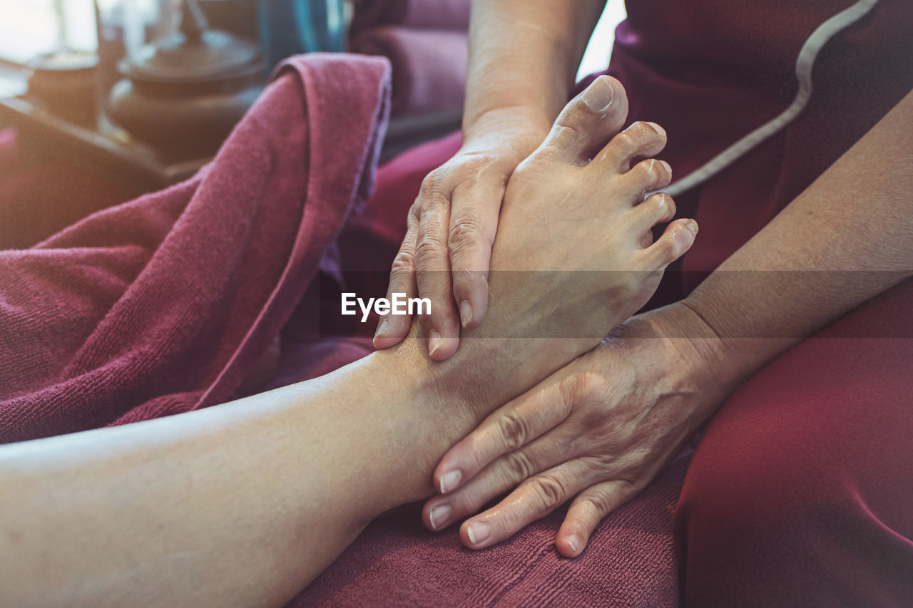 hand, adult, women, human leg, limb, two people, togetherness, indoors, arm, female, finger, person, close-up, lifestyles, healthcare and medicine, nail, bonding, care, relaxation, skin, love, men